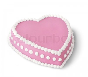 1752045-pink-heart-shape-marzipan-cake-decorated-with-white-whipped-cream